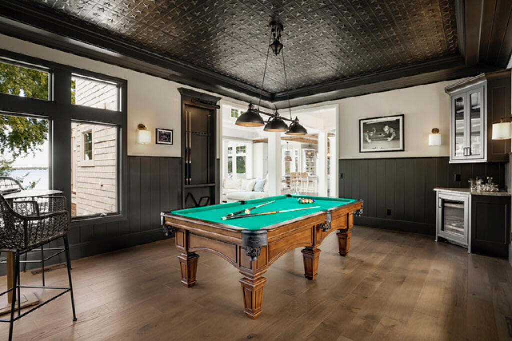repurposed as game room and bar by konen homes after