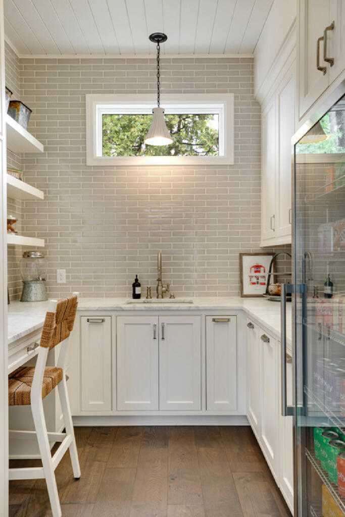 laundry room turned funtional pantry by konen homes after