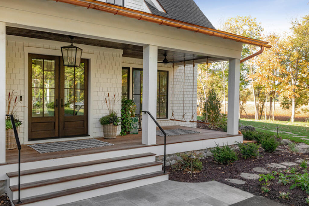swinging back porch by konen homes